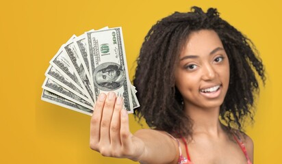 Young girl student hold cash money banknotes