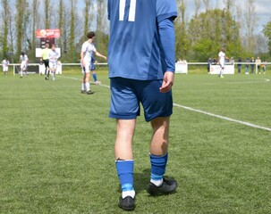 Obraz premium le footballeur sur le terrain
