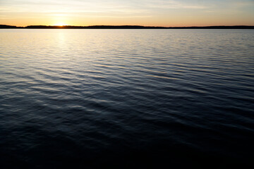 Obraz premium Sunset over lake - Masuria, Poland