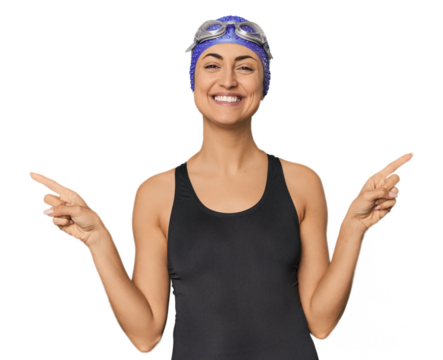Young Caucasian female professional swimmer pointing to different copy spaces, choosing one of them, showing with finger.