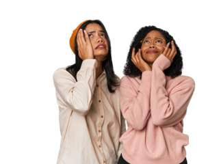 Young Latin friends together in studio whining and crying disconsolately.