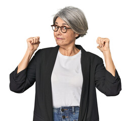 Obraz premium Caucasian mid-age female in business suit feels proud and self confident, example to follow.