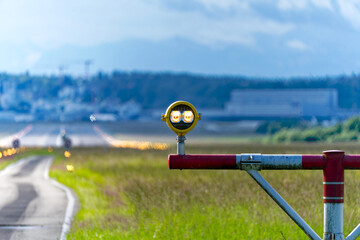 Scenic view of runway number 14 with beacon spotlights at Swiss airport Zürich Kloten on a cloudy...