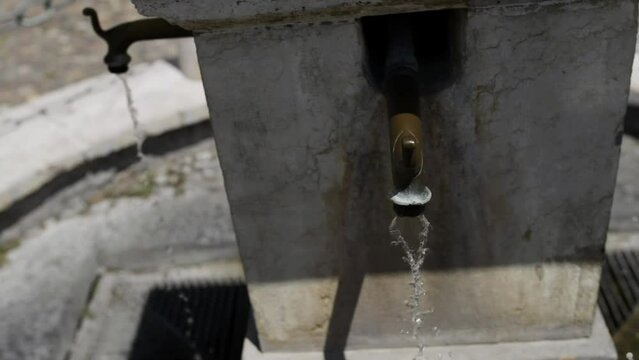 bronze faucet for water in Piazza Canossa, Mantua