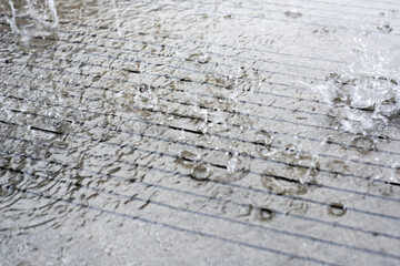 Rainwater falls on the ground