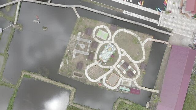 Establish aerial view of the water tourism in Banto Royo, Agam Regency, West Sumatra. d-log raw stock video