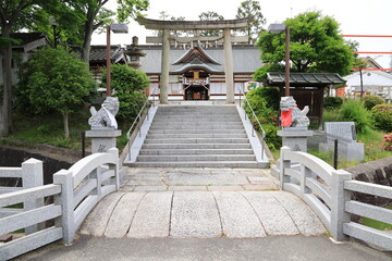 Fototapeta premium A Japanese shrine in Katano City in Osaka Prefecture : a scene of the entrance to the precincts of Hoshida-jinja Shrine
