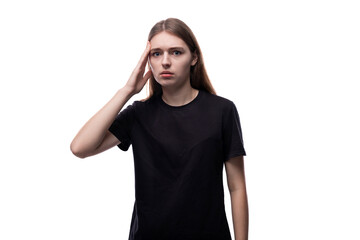 Distressed fair-haired teenage girl in a black T-shirt