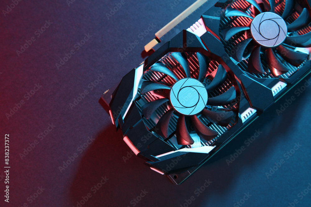 Fototapete computer graphics card on color background, top view. space for text