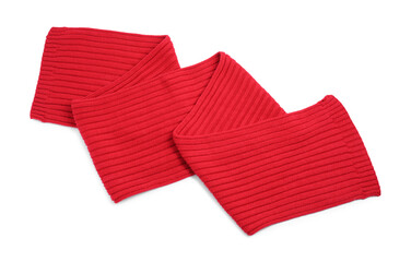 One red knitted scarf on white background, top view