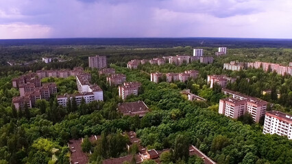 Aerial shot. Abandoned residential buildings in the tree-lined city of Pripyat. The city of...