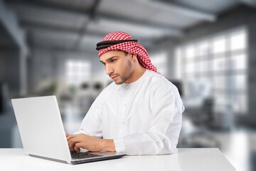 Portrait of  Middle Eastern Working in office