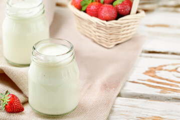 natural organic yogurt in jars on the table