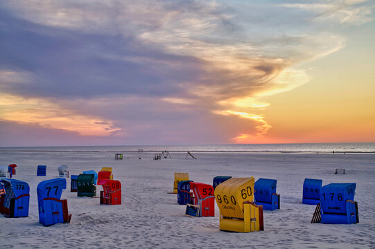 Empty beach chairs on a beach at sunset, Juist, Aurich, East Frisia, Lower Saxony, Germany