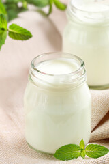 natural organic yogurt in jars on the table