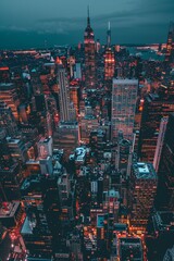 Naklejka premium A scenic aerial view of a bustling metropolitan landscape illuminated by city lights during twilight,