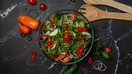 Vegetable salad in a plate top view