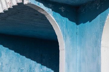 Abstract architecture photo with blue and white concrete exterior