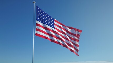 Fototapeta premium Patriotic American Flag Waving in Breeze Under Clear Blue Sky