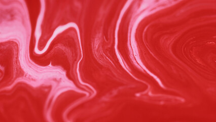 Fototapeta premium Acrylic mix. Liquid marble texture. Defocused red white color pigment dust particles paint emulsion leak ink fluid spill abstract art background.