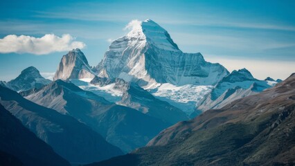 Fototapeta premium The Fitz Roy Mountains in Patagonia, which depicts a towering peak against a clear blue sky. The snow-capped peak contrasts with the lush green valleys, creating a visually striking picture.