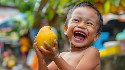 child holding a fruit