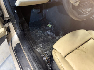Car interior after flooding. Traces of mold in the car interior after water exposure. Damaged car...