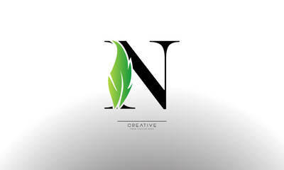 Letter N eco leaf logo icon design template elements. Vector color sign
