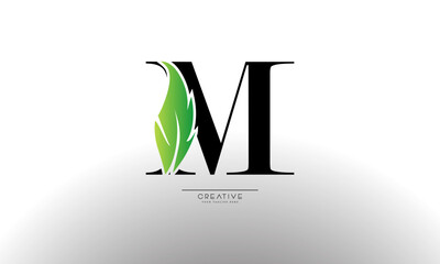 Letter M eco leaf logo icon design template elements. Vector color sign
