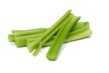 Fresh celery stems on a white background