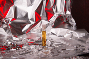 close up of old perfume samples on background