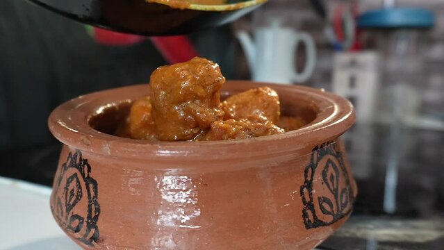Indian famous recipe handi butter chicken or chicken curry cooked in butter