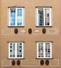 Obraz premium Decorated colorful walls and windows of luxury ancient mansion 