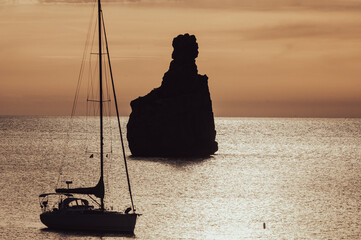 Sunset on Benirras beach in Ibiza in summer