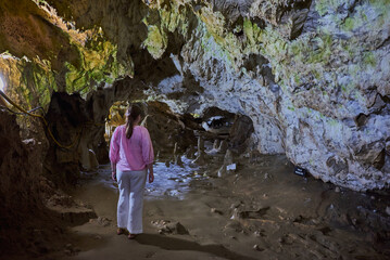 Rock formations and abstract texture on the walls in the Polovragi Cave with stalactites and stalagmites