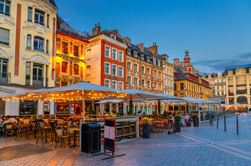 Street restaurant near Flemish mannerist architecture style buildings, Vieille Bourse on La Grand...