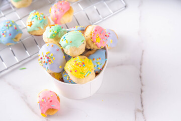 Sweet colorful glazed donuts holes dessert