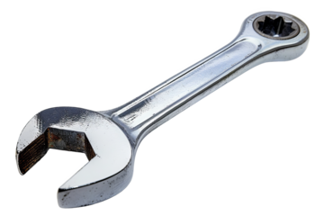 Close-up image of a shiny metal wrench isolated on a white background, perfect for tool-related projects and industrial themes.