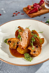 Pork Medallions with Roasted Potatoes and Mushrooms in a Creative Plating
