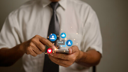  businessman is using smartphones for online communication. Social media, using smartphones for remote work..The concept of digital media technology and the Internet.