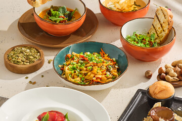 Colorful Vegetable Udon Noodles with Sesame Seeds in Gourmet Setting