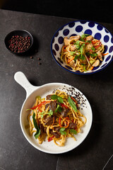Delicious Lagman with Beef and Chicken - Traditional Central Asian Noodle Dishes, Shot from Above