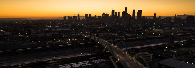 Mesmerizing 4K Drone Shot at dusk: Sixth Street Viaduct - Aerial View Connecting Downtown LA Arts District to Boyle Heights
