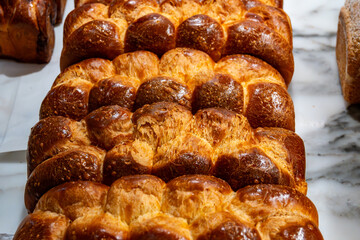 Traditional Jewish bread challah braided brioche bread in bakery