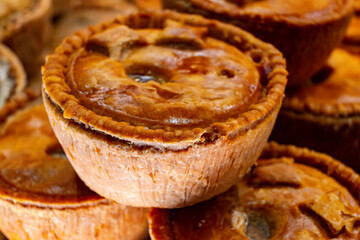 Fresh baked stuffed meat pies, Britisch pastries, snacks