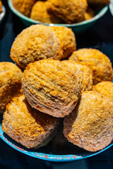 Traditional street food in UK, stuffed fried Scotch eggs with breadcrumbs close up