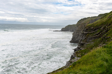 Saint-Jean-de-Luz fishing port on Basque coast, famous resort, known for beautiful architecture, sandy beaches, cuisine, Santa Barba rocks, South of France, Basque Country