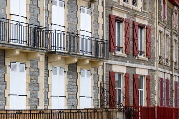 Houses and streets of old part of Saint-Jean-de-Luz fishing port on Basque coast, famous resort, known for beautiful architecture, sandy beaches, cuisine, South of France, Basque Country © barmalini