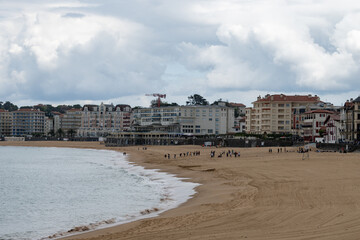Houses and beach in Saint-Jean-de-Luz fishing port on Basque coast, famous resort, known for...
