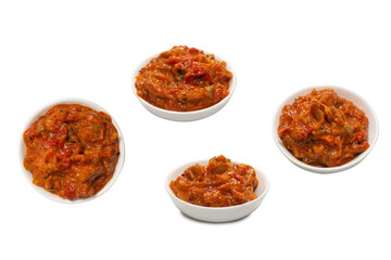 Vegetable stew in a bowl isolated on white background.